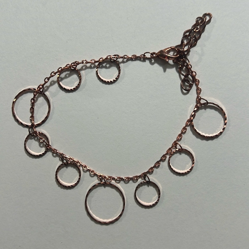 Copper color delicate charms bracelet
